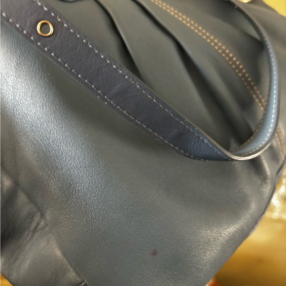 Clean inside and out just one little red dot on the front of bag - Picture 3 of 3